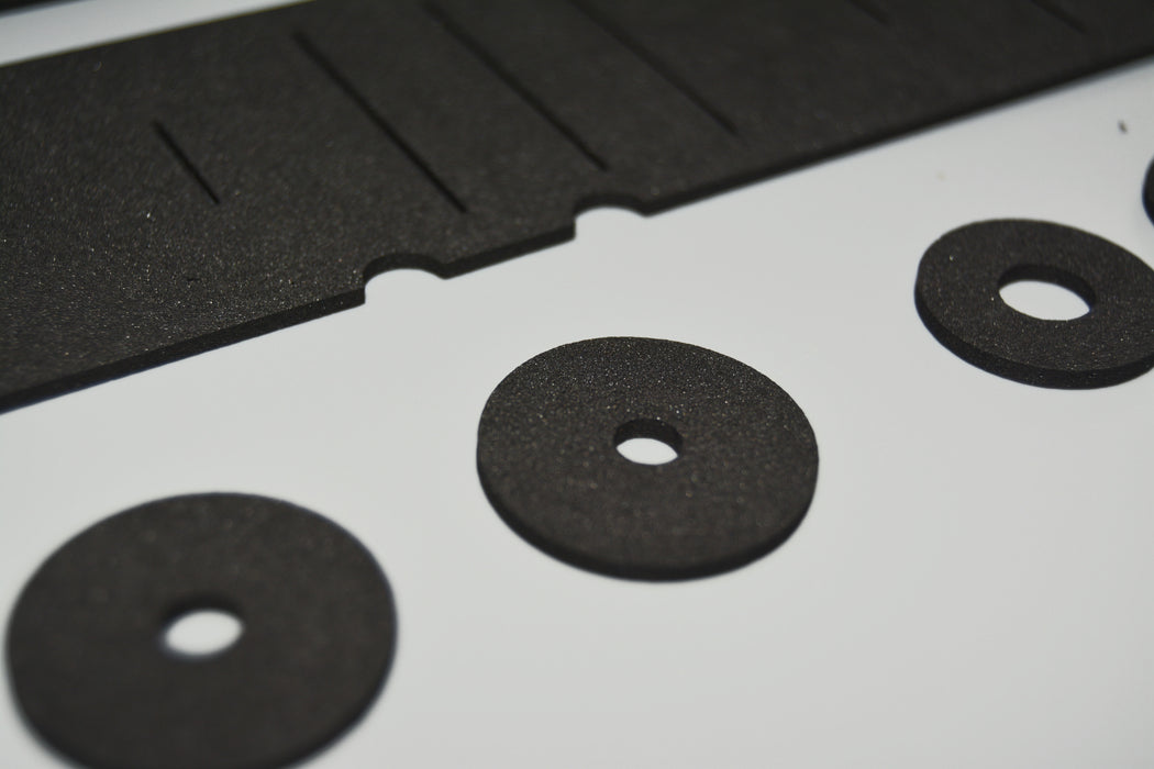 Close-up of SH-101 replacement gasket pieces and washers